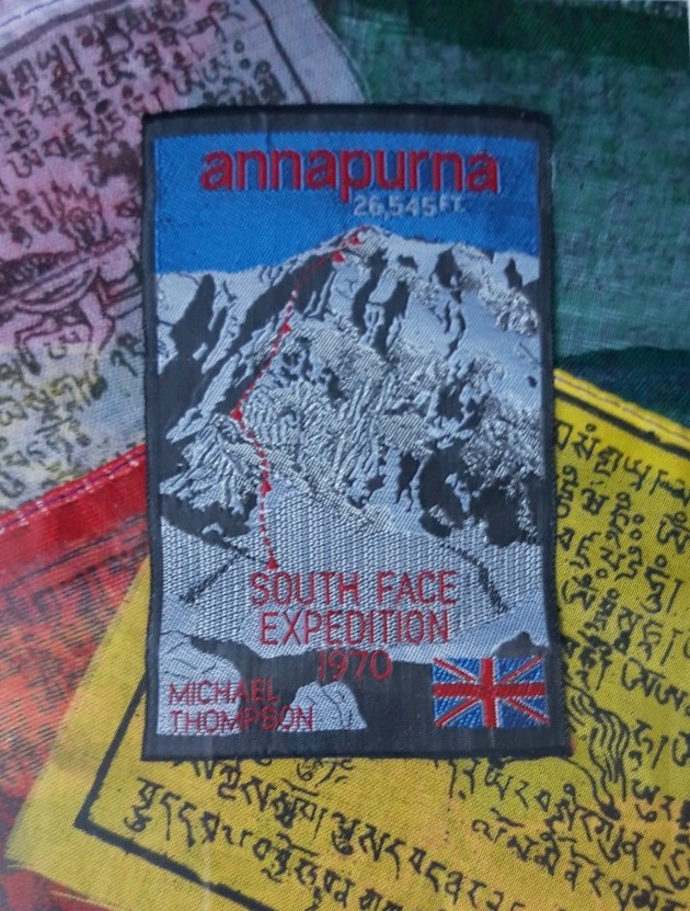 Embroidery in remembrance of the 1970 Annapurna  expedition with Nepalese prayer flags. 