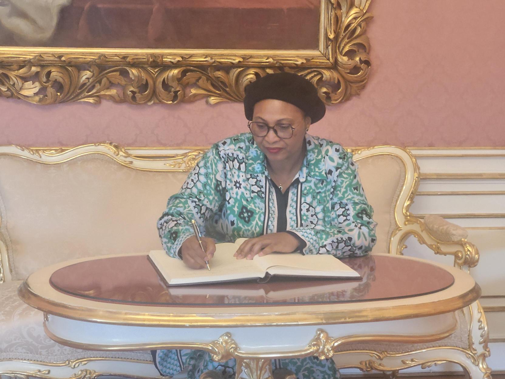 H.E. Maimounata Ouattara signing the IIASA guestbook