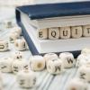 the word equity made out of cubes with letters
