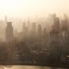 Smog lies over the skyline of Historical architecture and modern