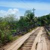 Crumbling tropical bridge