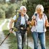 Senior couple hiking in the forest
