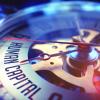 Stopwatch with human capital written on clock face