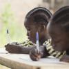 Children at school doing homework