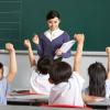 Chinese children in classroom engaging in lesson