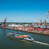 Rotterdam, Netherlands - May 07, 2020: view on the cargo port buildings infrastructure from cruise ship