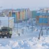 View of the snow-covered street of the northern arctic city