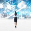 Businesswoman in front of screen