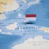 The Flag of indonesia on a world map