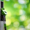 Biofuel filling station on a green background