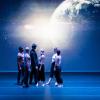 Performers on the stage during a performance of Breath