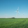 Wind turbines against a blue sky