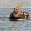Refugees arriving in Greece in dingy boat from Turkey.