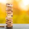 Jenga tower balancing with pieces missing