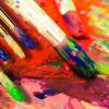 Colorful paintbrushes on canvas