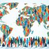 Colorful silhouettes of people representing a diverse global population on a world map
