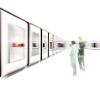 Blurred image of people looking at artwork against a white background