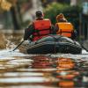 Flood response team navigating through inundated urban area during emergency