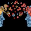 two human heads shaped with gears with red and gold brain idea made of cogs representing the concept of intellectual exchange