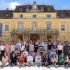 Group picture of the 2024 YSSP cohort in front of Schloss Laxenburg.