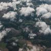 Aerial Shot of Field Under the Cloudy Sky