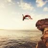 Cliff Jumping into the Ocean at Sunset, Summer Fun Lifestyle
