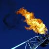 Gas Vent Flare. Unusable gas flares from an offshore oil & gas rig. 