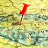 Close up of Prague on a map with red pin 