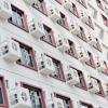 Wall with many air-conditioners, China. 