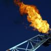 Gas Vent Flare. Unusable gas flares from an offshore oil & gas rig.