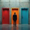 Business man stands before seven colorful doors. Faces big decision, crucial life career choice. Many paths, future possibilities await. Uncertainty choices presented for way forward in. AI generated 