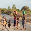 Group of young African women standing on a road
