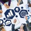 People around a table with images of strategy concept