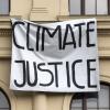 Climate Justice Banner outside building school university