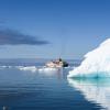 boat by iceberg